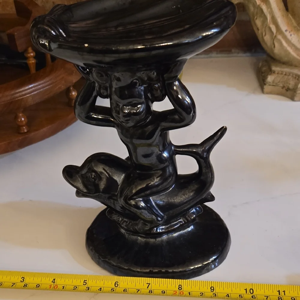 Black Ceramic Figurine with Mythical Design